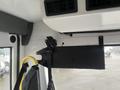 Interior view of a 2018 Chevrolet Express showing the dashboard with a mounted bracket and support for various equipment