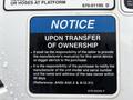 Sign displaying a notice about responsibilities upon transfer of ownership for a 2013 International DuraStar vehicle