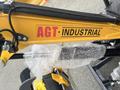 A yellow AGT Industrial MX12R machinery component with bubble wrap on one part and a clear label displaying the brand name in bold letters