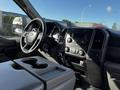 Interior view of a 2018 Ford F-550 showing the dashboard steering wheel and control panel