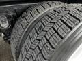Close-up of a tire from a 2008 International 7500 showing deep tread patterns designed for traction and grip