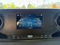 2023 Mercedes-Benz Sprinter dashboard featuring a touchscreen display with navigation and radio controls