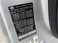 2006 Land Rover LR3 identification label displaying manufacturing details and specifications on a silver surface