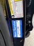 A 2021 Ford Explorer service sticker displaying the text Next Service and the number 151171 KM