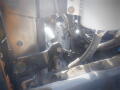 Close-up view of the engine compartment of a 2016 International WorkStar 7500 showing engine components and connectors