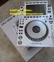 Pioneer CDJ-3000 digital DJ turntable featuring a circular jog wheel touchscreen display and various buttons and knobs for controls