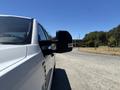 A 2020 Ford F-350 SD with a side mirror visible in the foreground