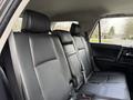 Interior of a 2021 Toyota 4Runner showing the back seats in black leather with headrests