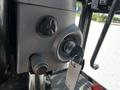 The image shows the ignition panel of a 2018 New Holland Boomer 45 featuring a key slot a large dial and additional controls