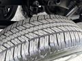 Close-up of a 2018 Ford F-150 tire showcasing its tread pattern and surface details