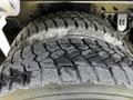 Close-up of a treaded tire from a 2017 International WorkStar 7600 showing deep grooves and a rugged texture designed for durability and grip