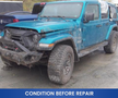 A blue 2020 Jeep Wrangler with visible damage on the front and rugged tires showing signs of wear and dirt