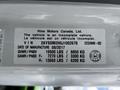 2018 Hino 195 vehicle information label displaying VIN, weight capacities, and manufacturing details