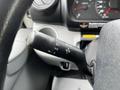 Close-up of the turn signal lever and control stalk in a 2019 Hino 195 truck showing various function symbols and indicators