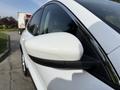 A white 2020 Ford Escape with a close-up view of the side mirror