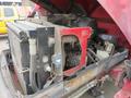 2013 Toro Grounds Master 5910 showing the engine compartment with exposed components including the radiator and various mechanical parts