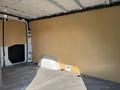 2021 Mercedes-Benz Sprinter with an empty cargo area featuring wooden paneling on the walls and a smooth floor