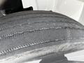 Close-up of a tire from a 2019 International 4300 showing tread patterns and wear details