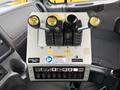 Control panel of a 2016 Freightliner 108SD featuring multiple levers and buttons for operating snow plow functions