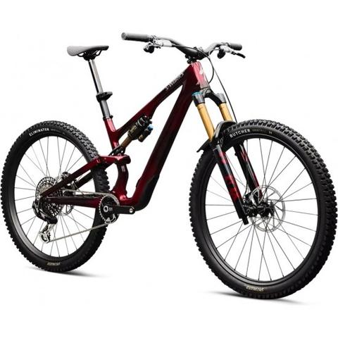 A 2026 Specialized S-Works Stumpjumper 15 EVO Mountain Bike featuring a sleek design metallic red frame high-performance suspension and rugged tires
