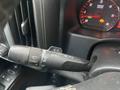 The image shows the turn signal and wiper control stalk of a 2015 GMC Sierra 1500 with various settings and indicators