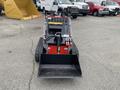 A 2024 AGT Industrial LRT23 compact track loader with a bucket attachment at the front and tracks for movement