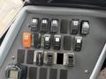 Control panel of a 2016 International CE300 featuring various switches and buttons for operational functions such as lights heater and noise suppression