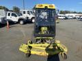 A yellow 2010 Kubota F3680 lawn mower with a cab and front-mounted mower deck