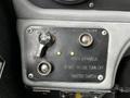 Control panel of a 2009 Spartan Gladiator featuring a master switch ignition button and indicator lights for apparatus status