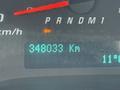Dashboard display of a 2019 Chevrolet Express showing the odometer reading of 348033 kilometers and the temperature at 11 degrees Celsius