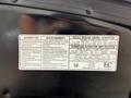 A vehicle emission control information label from a 2014 Honda Odyssey detailing regulations and specifications for gasoline use
