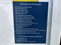 A blue information panel detailing winterization procedures for a 2009 Ford F-550 with instructions for attaching hoses and adjusting valves