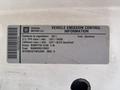 2011 Chevrolet Colorado emission control information label with details on regulations and fuel type