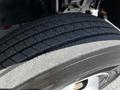 Close-up of the tire tread of a 2020 Hino 155 showcasing the grooves and rubber texture