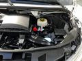 2020 Mercedes-Benz Sprinter engine bay showing various components including the air filter housing coolant reservoir and intake system