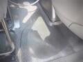 Interior view of a 2016 International WorkStar 7500 floor with textured black surface and visible foot pedals