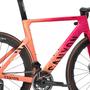 A 2025 Canyon Aeroad CFR AXS Road Bike featuring a sleek design with a gradient pink to orange frame stylish components and aerodynamic features
