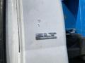 2009 Dodge Ram 5500 badge displaying SLT emblem on the side of the vehicle