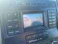 The dashboard of a 2017 Ford F-150 featuring a touchscreen display with a rear-view camera interface and various control buttons for audio and settings