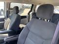 Interior of a 2020 Dodge Grand Caravan showing front seats with fabric upholstery and headrests