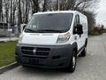 A white 2018 RAM Promaster van with a black front bumper and grille facing forward