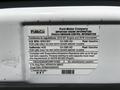 2019 Ford Econoline vehicle emission control information label displaying engine specifications and compliance details for gasoline fuel type