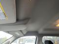 Interior view of a 2019 RAM 1500 Classic showing the ceiling and overhead console with a light fixture and sun visor