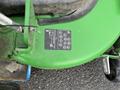 Close-up of the control panel on a 2014 John Deere 1585 Terrain Cut featuring symbols for operation and maintenance instructions
