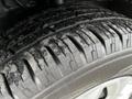 Close-up of a tire from a 2020 Ford Transit showing detailed tread patterns and surface texture