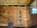 A 2012 Chevrolet Express with a wooden interior and metal accents is visible in the foreground