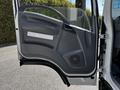 Door of a 2007 GMC W3500 with a gray interior and a handle on the inside