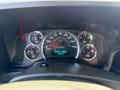 Dashboard of a 2021 Chevrolet Express showing speedometer fuel gauge and engine hour meter