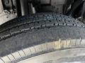 Close-up of a worn tire from a 2007 GMC W3500 showing visible tread patterns and signs of use