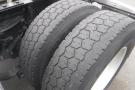 Close-up view of two rear tires on a 2015 Kenworth T660 showing tread patterns and dual setup